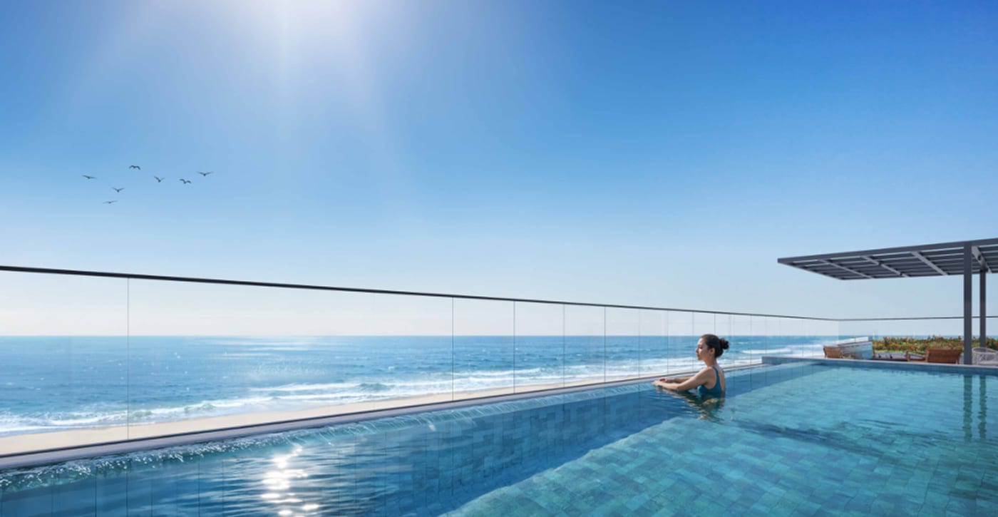 Rooftop com piscina de borda infinita do Dumont Art