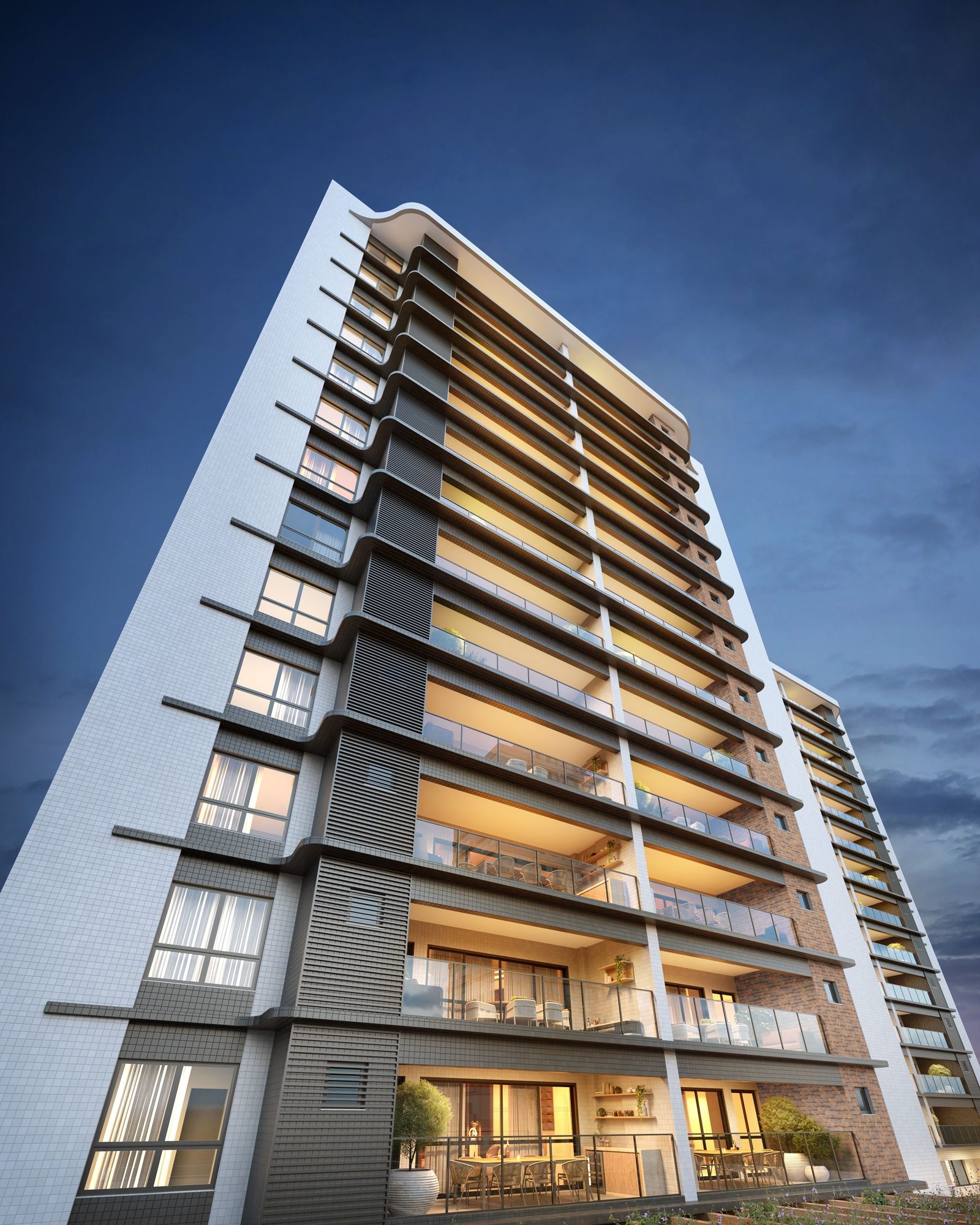 Fachada noturna do Riviera Residence
